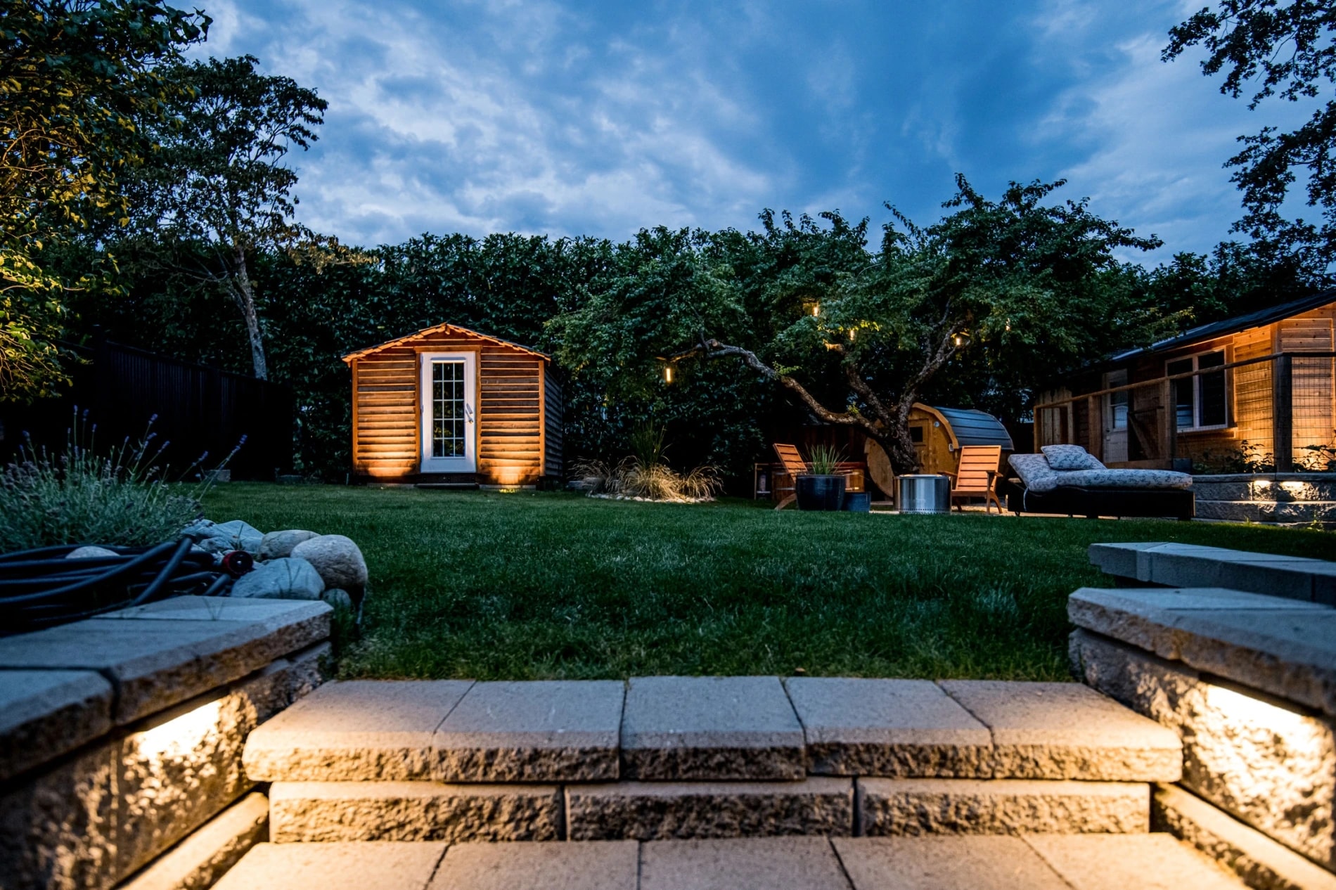 landscape lighting on patio stairs in Victoria backyard