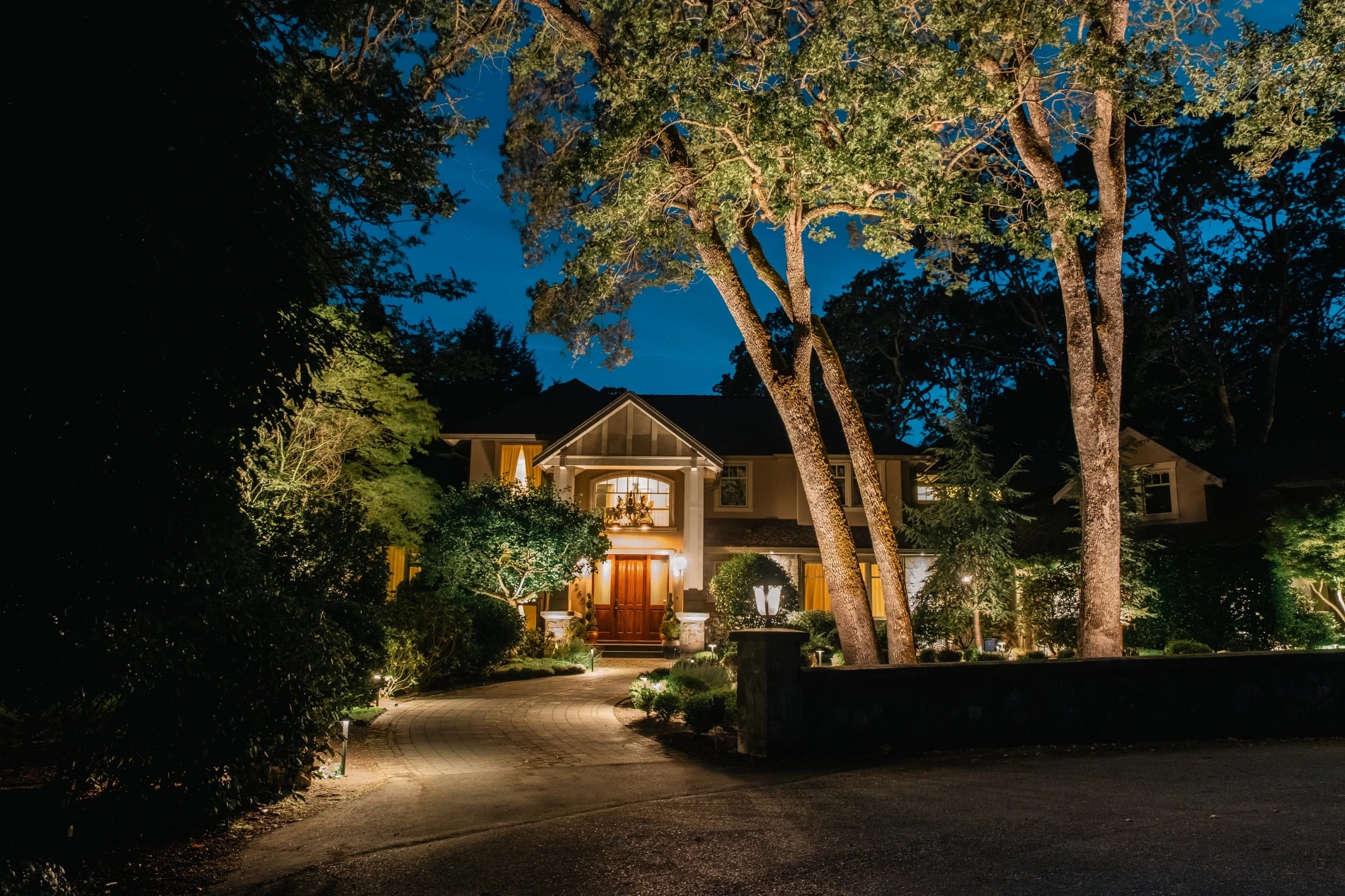 House with Landscape lighting in Uplands, Victoria BC