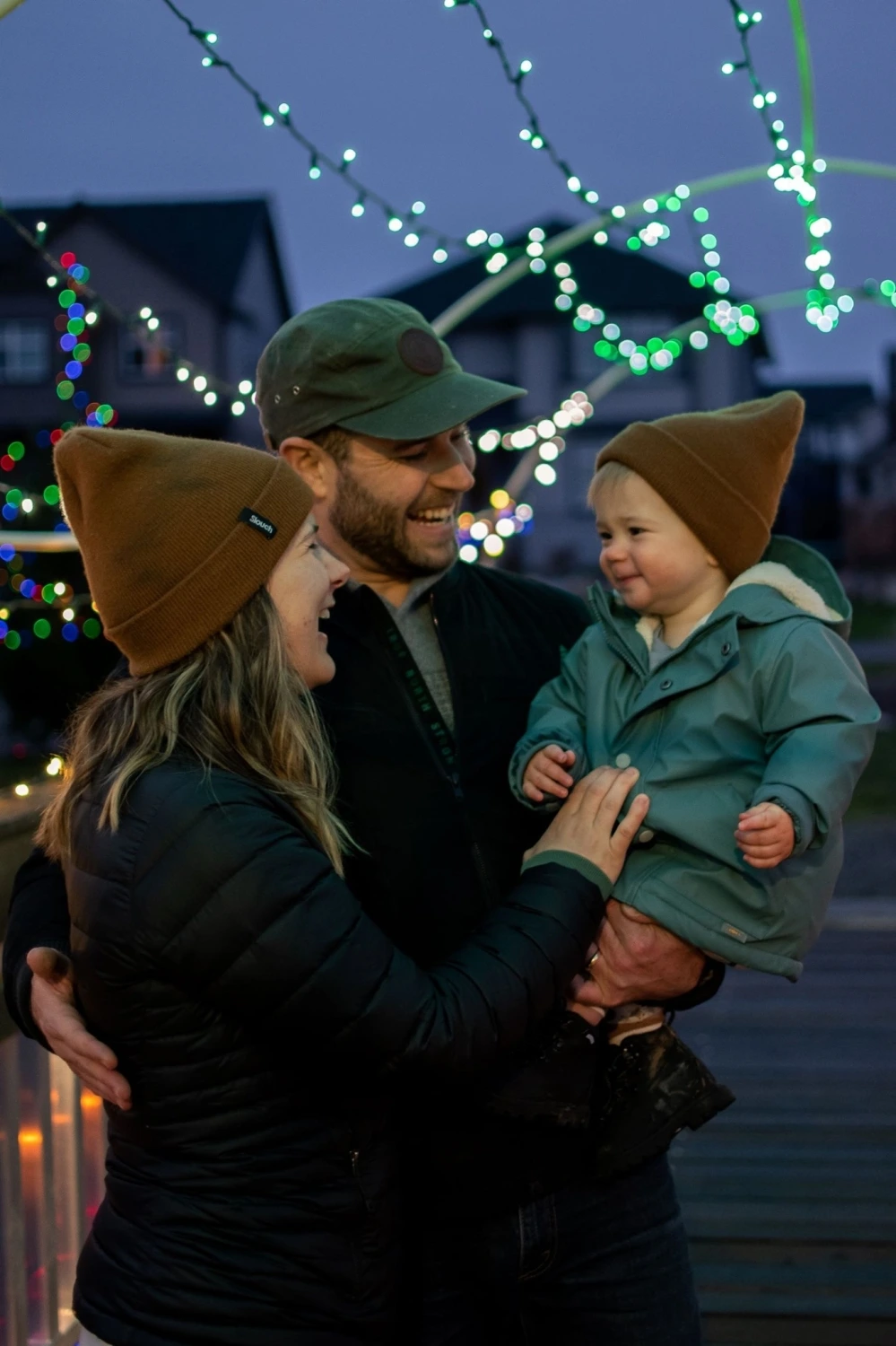 young family enjoying a holiday event light display crafted by Light Right