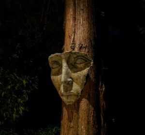 Face sculpture illuminated